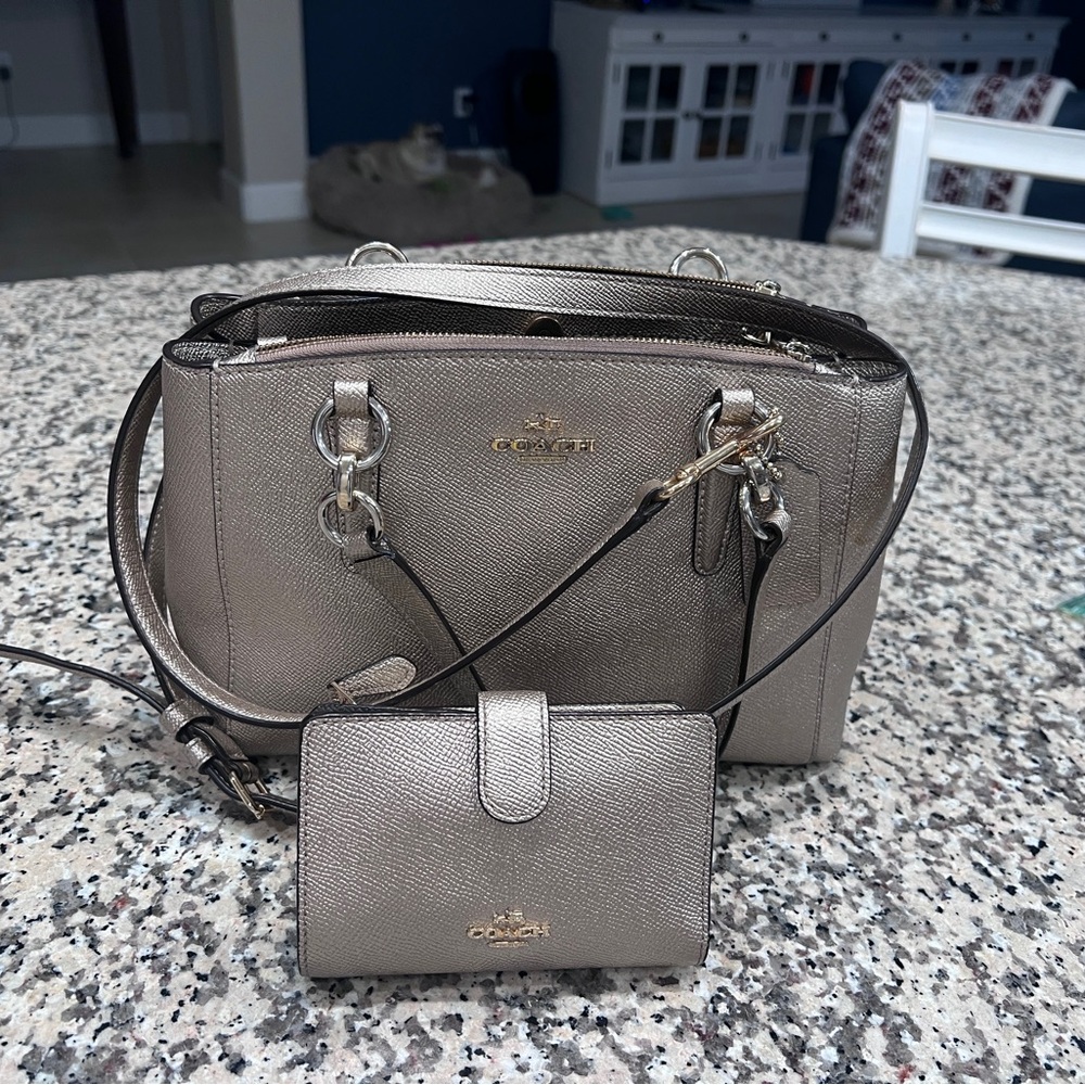 Coach crossgrain leather Mini christie Carryall.
Metallic blonde in color.